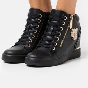 ALDO aloivu sz 7.5. NEW never worn. black heeled bedazzled sneakers.